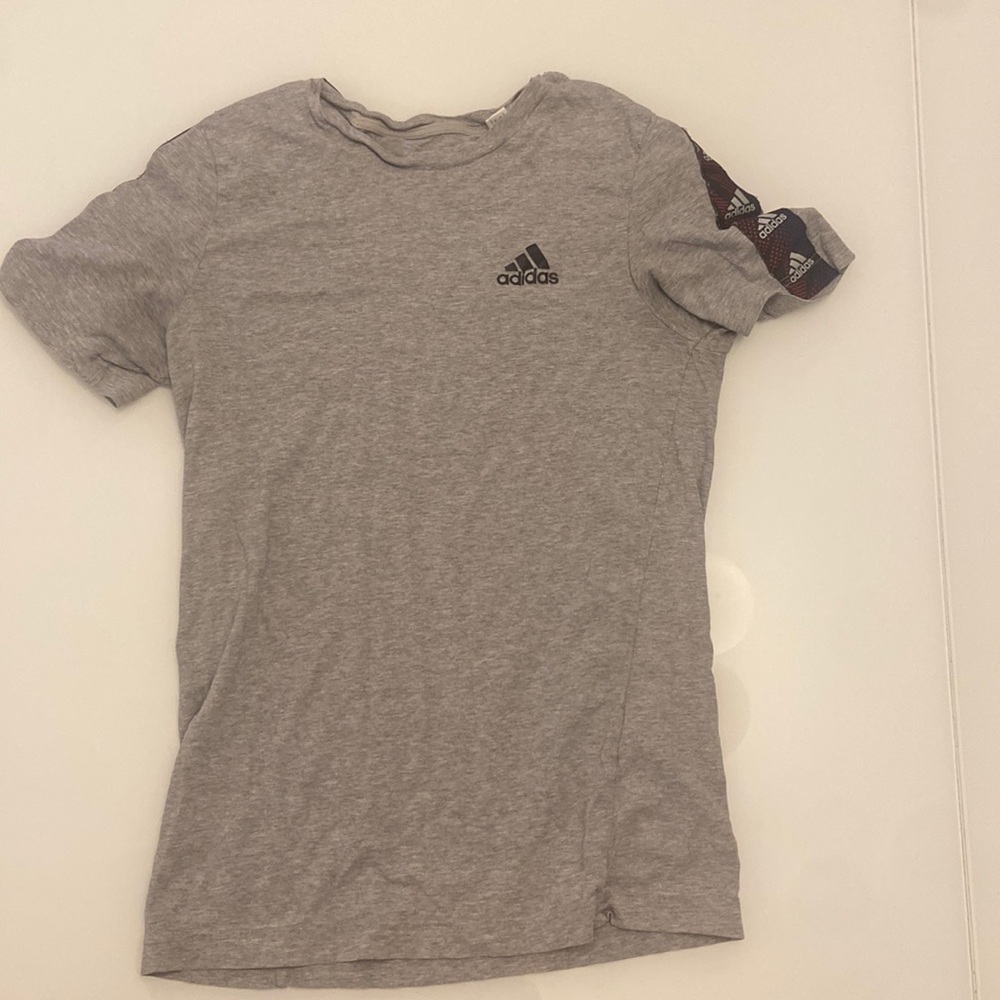 I am selling this grey addidas sweatshirt.